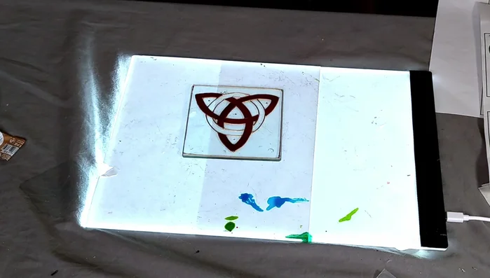 Add yellow accents: Once the red paint is dry, add yellow paint to specific areas of the design.