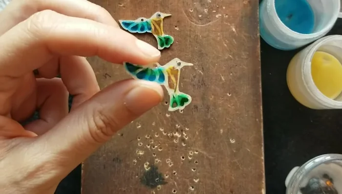 Fire the earrings again in the kiln.