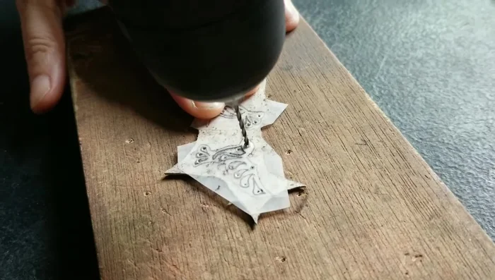 Cut out the hummingbird shapes using the saw.