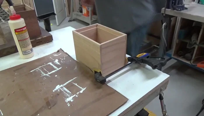Gluing and clamping the half-lap box.