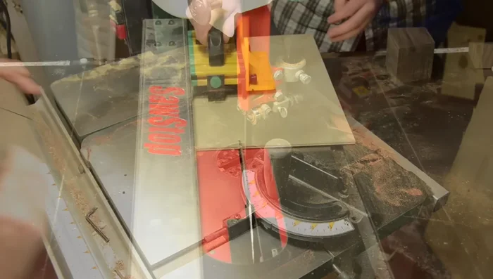 Glue the plywood square onto the angled top of the pencil holder, then sand it flush.