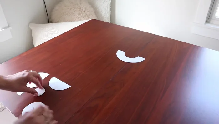 Prepare paper stencils and plan your layout.