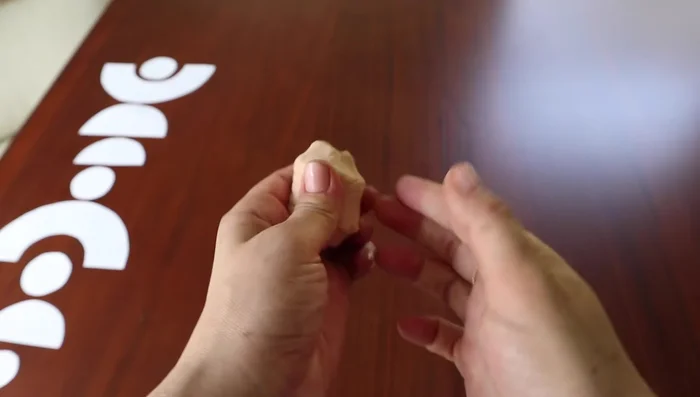 Soften the clay and roll it out thinly.