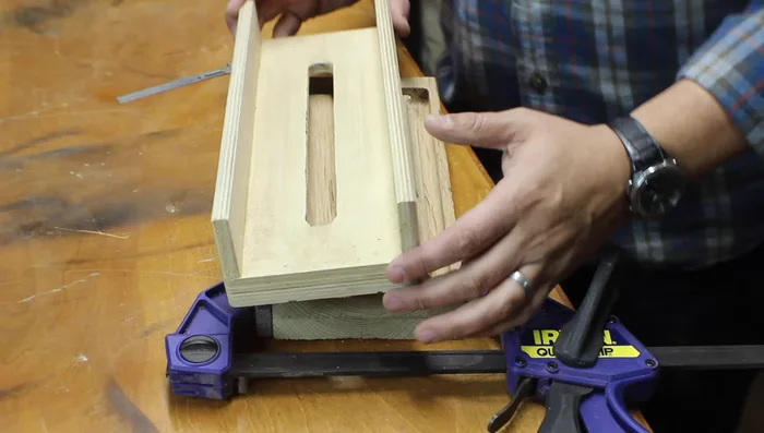 Use a roundover bit to clean up the top edge.