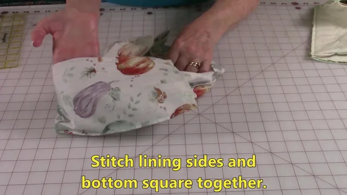 Attach lining to bottom: Attach the lining bottom and sides together, mimicking the process for the outer fabric. 