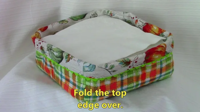 Finishing touches: Fold over and neatly finish the top edge. Insert your napkins.