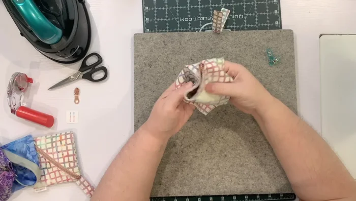 Sew the sides of the pouch together, leaving a small opening for turning.