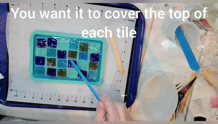 Cure the resin: Allow the resin to cure completely. Use a heat gun and alcohol spray to address any remaining bubbles.