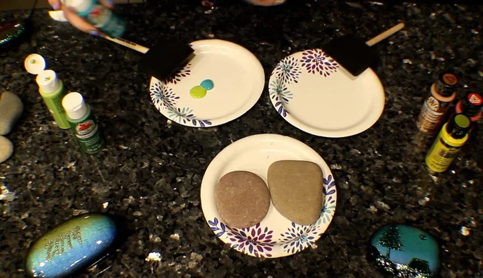 Place blobs of paint next to each other on a plate.