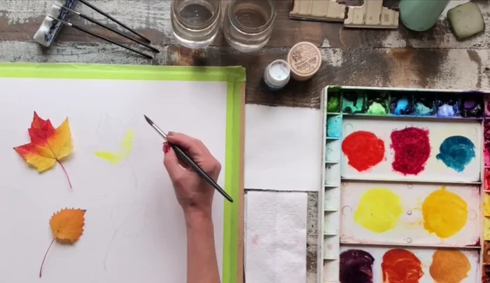 Apply Hansa yellow as a base color, keeping the brush point towards the outer contours for clean edges.