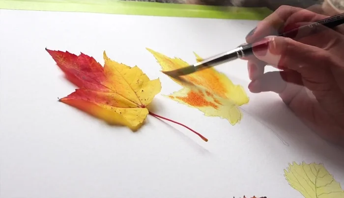 Splatter water into the paint that's starting to dry to create texture.