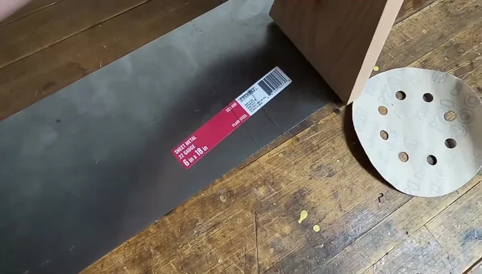 Polish the steel using Mother's polish and a buffing wheel.