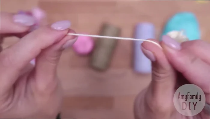 Weaving Method 2 (Needle Method): Use a large needle to weave the thread around the base, creating loops and tightening each one. Add beads as desired.