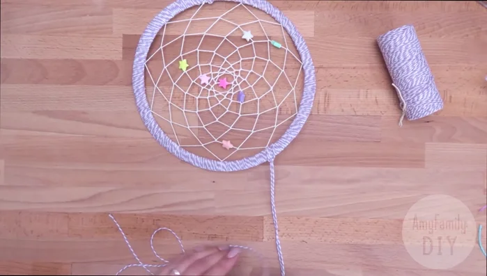 Decorate: Add feathers, beads, or tassels to the bottom. Secure with glue or knots.