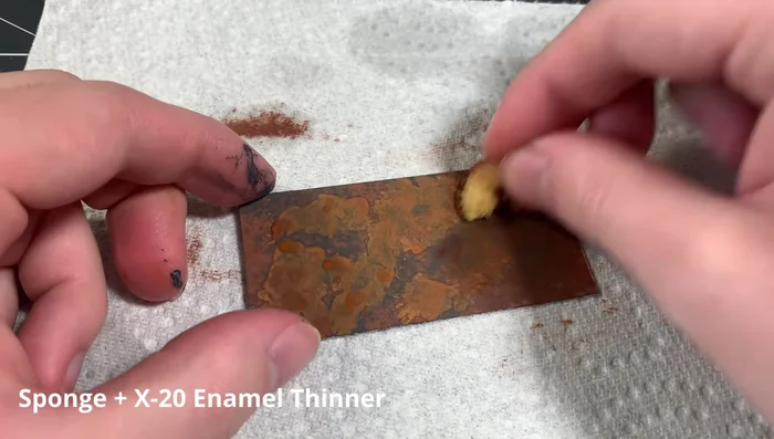 Repeat the sponging technique with the lighter rust wash.
