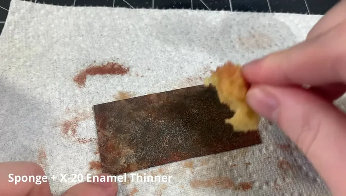 Repeat the sponging technique with the light dusty tone wash.