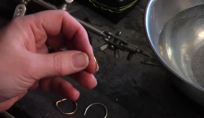 Cut and prepare the wire: Cut your wire to a size slightly smaller than your desired ring size (about half a size smaller). File down any burrs or sharp parts to ensure a smooth, even joint for soldering.