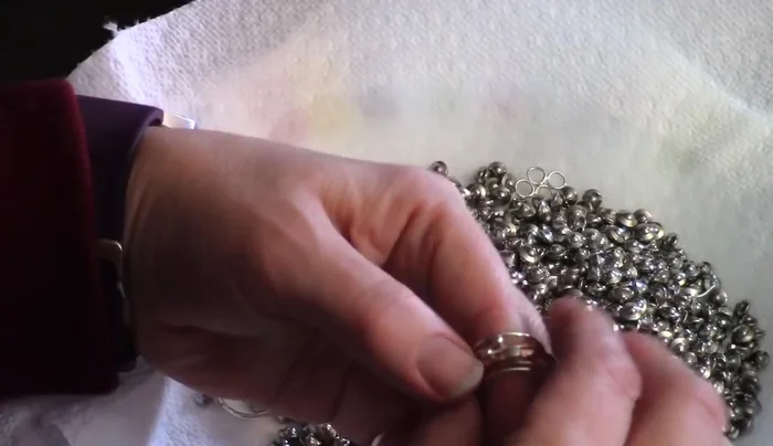 Final shaping: Wire-harden and straighten the ring using nylon pliers and a hammering block to ensure a perfect fit and finish.