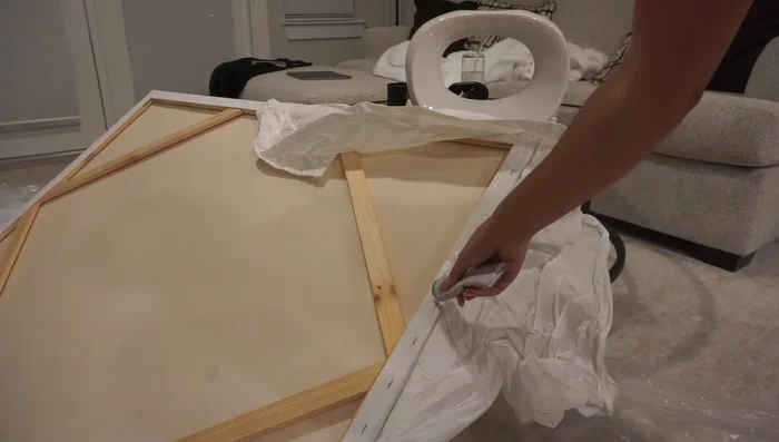 Finish the edges: Use E6000 glue to fold over the fabric edges for a neat finish. Alternatively, you can staple the edges.