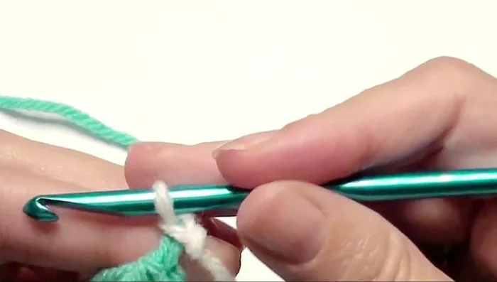 To add a new color, slip stitch, chain 1, turn, and repeat the pattern.