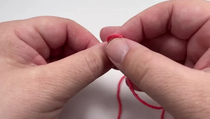 Cast on stitches using the long-tail cast-on method (or your preferred method). The total number of stitches will depend on your desired blanket size. The pattern multiple for the middle textured panel is 10 + 4.