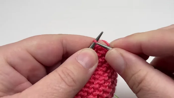 Row 4 (Wrong side): Knit nine stitches, slip marker, purl four stitches, *knit six, purl four; repeat from * to second marker, slip marker, knit eight, slip last stitch purlwise with yarn in front.