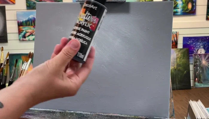 Without washing the brush, add cadmium yellow light hue to the outer edges, blending it into the white.