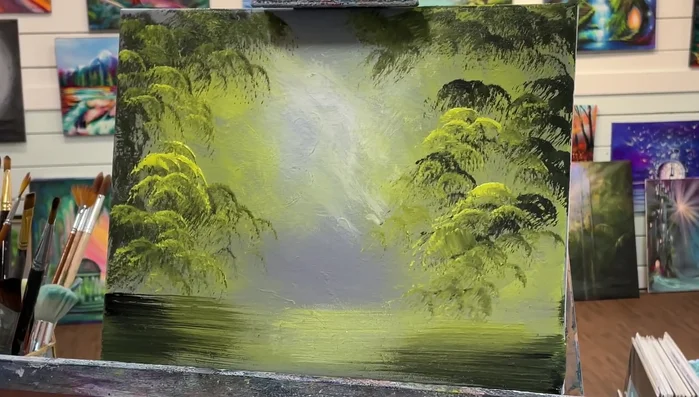 Use the round brush (wet with black and a touch of green) to add tree trunks and branches. Vary the thickness and create crooked branches by twisting and rolling the brush.