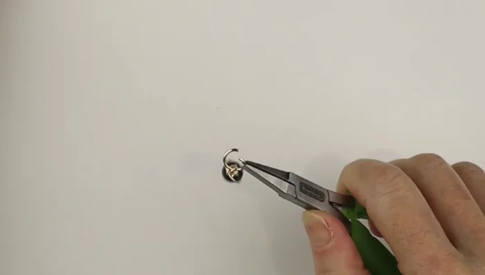 Open the jump rings and connect the beads together to form the bracelet length. Close the jump rings. You can hammer them for extra stiffness.