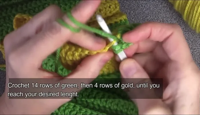 Repeat steps 7 and 9 until desired scarf length is reached (6 panels of green, 5 panels of gold in this example).