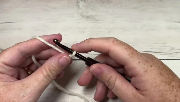 Make a slip knot and chain a multiple of 8 stitches plus 2 (26 chains for a 6-inch width).