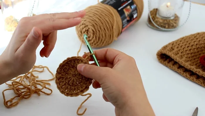 Round 5: Chain 2, then *(2 double crochet in one stitch), (1 double crochet in the next three stitches)* repeat from * to * around.