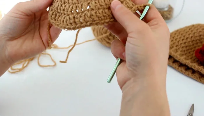 Round 6: Chain 2, then *(2 double crochet in one stitch), (1 double crochet in the next four stitches)* repeat from * to * around.