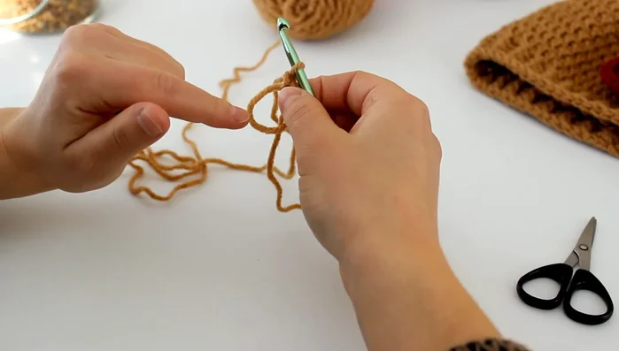 Slip stitch to the first double crochet to join.