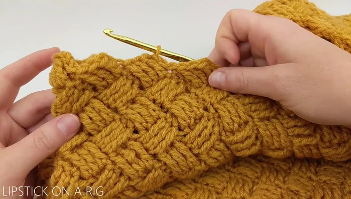 Create the flap: Lay the work flat, slip stitch along the side fold until you reach the other fold, chain one, single crochet in the next 72 stitches, chain one, turn. Repeat this row (approx. 23 rows).