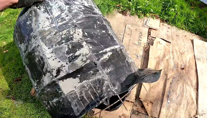 Create a mold: Use a garbage bag or other plastic sheeting draped over a frame (e.g., concrete reinforcement wire) to create a mold for the concrete pot. This will help with removal after drying.