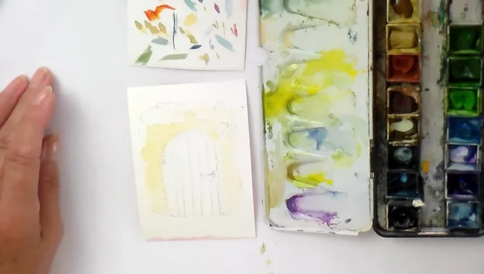 Paint the ivy stems and leaves, starting with a general mass of green before adding individual leaf shapes.