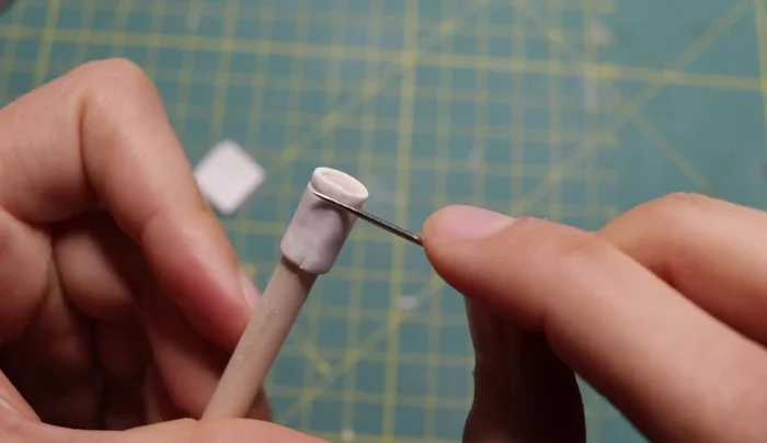 Remove from dowel: Remove the canister from the dowel (or bake together and remove after baking).