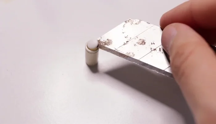 Ceramic lids: Create ceramic lids by rolling out clay, flattening it, adding a decorative clay snake and attaching it with liquid polymer clay. Varnish after attaching.