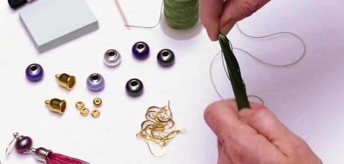 Glue the tassel into the cord end: Apply glue generously inside the cord end well, insert the tassel, and press firmly. Allow it to dry completely.