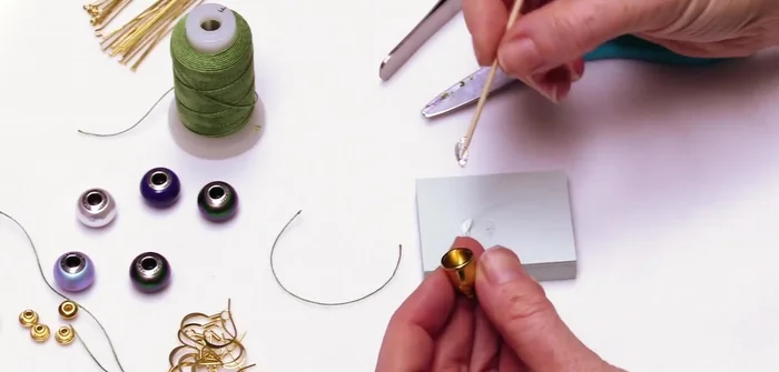 Glue the tassel into the cord end: Apply glue generously inside the cord end well, insert the tassel, and press firmly. Allow it to dry completely.