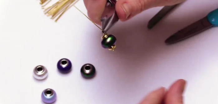 Secure the eye pin: Use wire looping pliers to create a secure loop at the end of the eye pin.