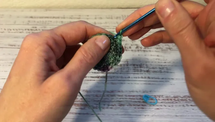 Round six: Two single crochets into the first stitch, then alternate one single crochet, two single crochets. (36 single crochets)