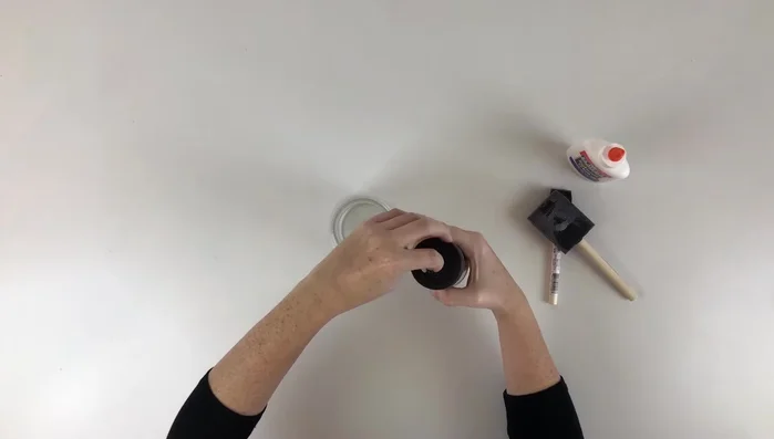 Shake in crystal glitter, ensuring the glue is completely covered.