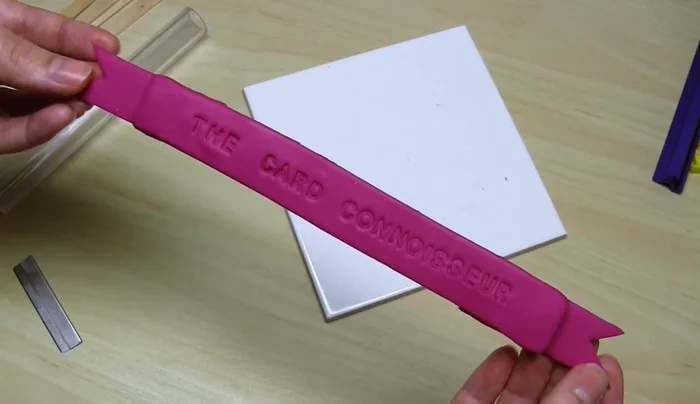 Sand the banner with sandpaper (320, 600, 1200 grit) for a smooth finish. Add a protective layer of varnish (optional).