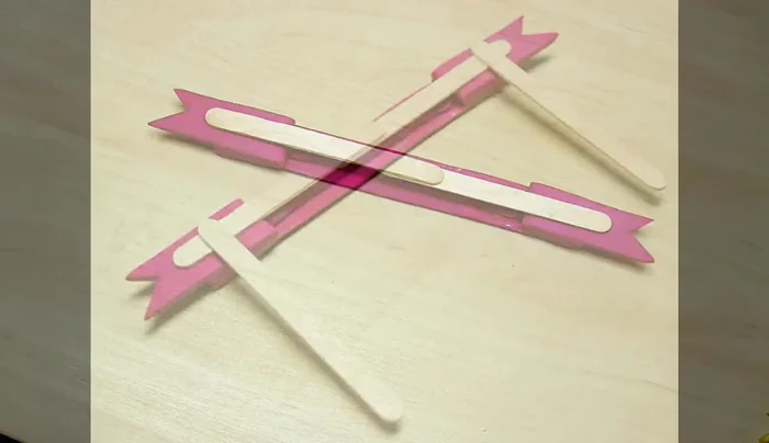 Glue on lollipop sticks or dowels for attaching to a surface.