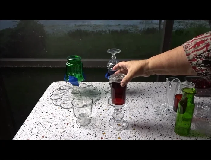 Glue the final pieces and attach the large marble to the top.