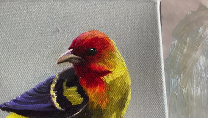 Add details to the wings, eyes, and other features using smaller brush and light touches.