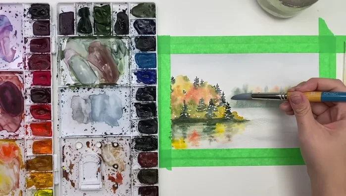 Add highlights: Use white ink to add highlights along the shoreline and in the water.