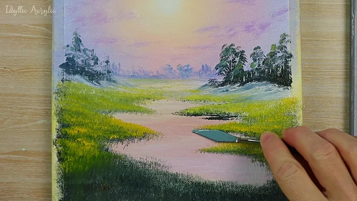 Add wildflowers in the foreground using a small round brush, flicking the brush upwards to create grass and using pinks and alizarin crimson for flower petals.